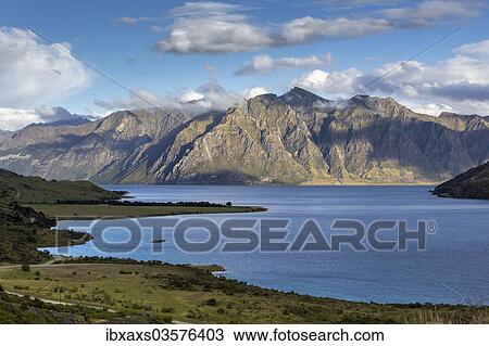 Stock Image - "Lake Hawea with the Corner Peak, The Neck, Otago Region, New Zealand, Oceania". Fotosearch