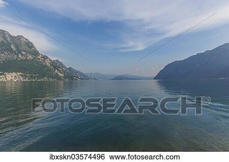 Stock Photograph - "Lake Iseo or Lago d'Iseo with Monte Isola, Riva di Solto, Bergamo, Italy, Europe". Fotosearch