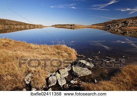 "Lake Lindersee near Zirbitzkogel mountain, Seetal Alps, Styria, Austria, Europe" View Large Photo Image Stock Photo - "Lake Lindersee near Zirbitzkogel mountain, Seetal Alps, Styria, Austria, Europe". Fotosearch