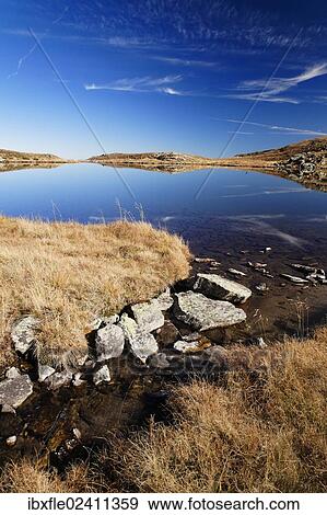 "Lake Lindersee near Zirbitzkogel mountain, Seetal Alps, Styria, Austria, Europe" View Large Photo Image Stock Photo - "Lake Lindersee near Zirbitzkogel mountain, Seetal Alps, Styria, Austria, Europe". Fotosearch