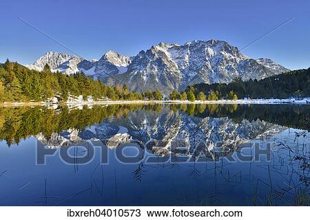 "Lake Luttensee and Westliche Karwendelspitze, Mittenwald, Bavaria, Germany, Europe" View Large Photo Image Stock Image - "Lake Luttensee and Westliche Karwendelspitze, Mittenwald, Bavaria, Germany, Europe". Fotosearch