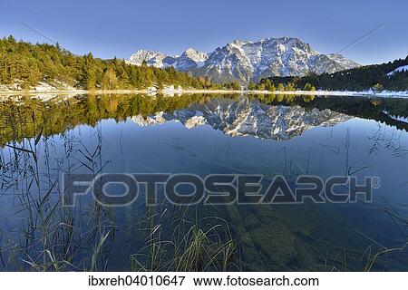 Stock Photo - "Lake Luttensee and Westliche Karwendelspitze, Mittenwald, Bavaria, Germany, Europe". Fotosearch