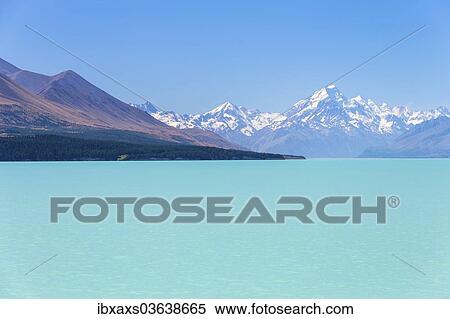 Stock Photography - "Lake Pukaki, Aoraki or Mount Cook behind, 3754m, Lake Pukaki, Pukaki, Canterbury Region, New Zealand, Oceania". Fotosearch