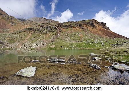 "Lake Schwarzsee, below the summit of Gleckspitz mountain in the Ulten valley, province of Bolzano-Bozen, Italy, Europe" View Large Photo Image Stock Photo - "Lake Schwarzsee, below the summit of Gleckspitz mountain in the Ulten valley, province of Bolzano-Bozen, Italy, Europe". Fotosearch