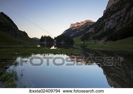 "Lake Seealpsee in the evening, Alpstein mountain group, Appenzell, Switzerland, Europe" View Large Photo Image Picture - "Lake Seealpsee in the evening, Alpstein mountain group, Appenzell, Switzerland, Europe". Fotosearch