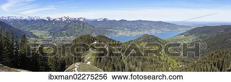 Stock Photograph - "Lake Tegernsee with Rottach-Egern and Bad Wiessee, Tegernsee valley, as seen from Baumgartenschneid mountain, Mangfall Mountains, Upper Bavaria, Bavaria, Germany, Europe". Fotosearch