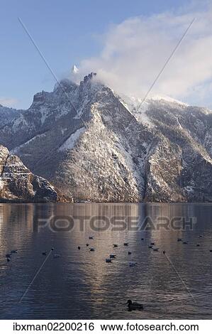 Stock Photograph - "Lake Traunsee with Erlakogel mountain and Roetelstein mountain as seen from Traunkirchen, Salzkammergut, Upper Austria, Austria, Europe". Fotosearch