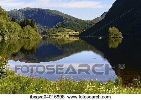 "Lake with reflection and shadows in the county of Sogn og Fjordane, Norway, Europe" View Large Photo Image Stock Photo - "Lake with reflection and shadows in the county of Sogn og Fjordane, Norway, Europe". Fotosearch