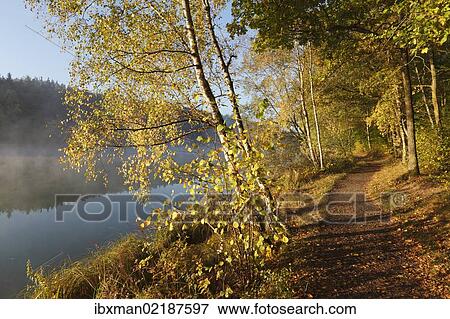 "Lakeside path along Lake Ellertshaeuser, Schweinfurter Land district, Lower Franconia, Franconia, Bavaria, Germany, Europe" View Large Photo Image Stock Photo - "Lakeside path along Lake Ellertshaeuser, Schweinfurter Land district, Lower Franconia, Franconia, Bavaria, Germany, Europe". Fotosearch