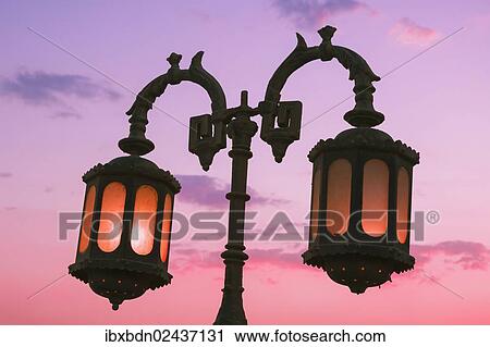 Stock Image - "Lamp post at dusk in the city of Dahab, Sinai, Egypt, Africa". Fotosearch