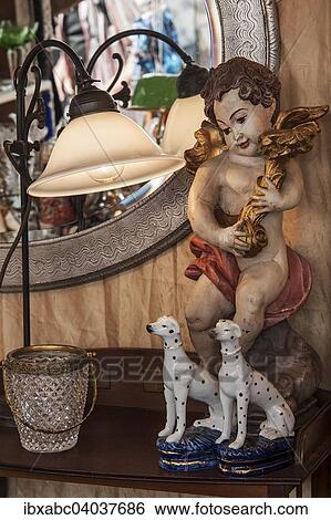 "Lamp with putto and greyhounds, Auer Dult fair, Munich, Upper Bavaria, Bavaria, Germany, Europe" View Large Photo Image Stock Photograph - "Lamp with putto and greyhounds, Auer Dult fair, Munich, Upper Bavaria, Bavaria, Germany, Europe". Fotosearch