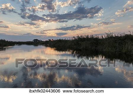 "Landscape along the Kwando River, Caprivi Strip, Namibia, Africa" View Large Photo Image Stock Photograph - "Landscape along the Kwando River, Caprivi Strip, Namibia, Africa". Fotosearch