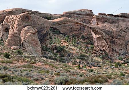 Stock Image - "Landscape Arch, rock arch made of red sandstone, Devils Garden, Arches National Park, Moab, Utah, USA". Fotosearch