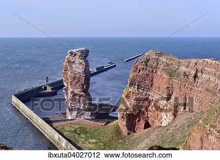 Stock Image - "Lange Anna, Tall Anna, red sandstone pinnacle, landmark of Heligoland, Schleswig-Holstein, Germany, Europe". Fotosearch