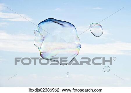 Large soap bubbles in front of a bright blue sky View Large Photo Image Stock Image - Large soap bubbles in front of a bright blue sky. Fotosearch
