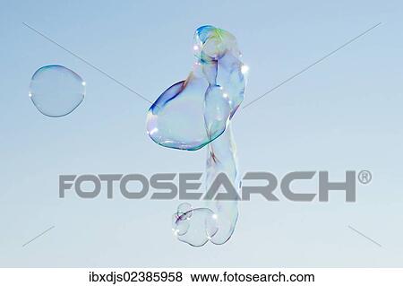 Large soap bubbles in front of a bright blue sky View Large Photo Image Stock Photo - Large soap bubbles in front of a bright blue sky. Fotosearch