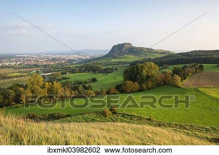 "Late summer light in the Hegau region with Mt Hohentwiel, city of Singen on the left, Konstanz district, Baden-Wurttemberg, Germany, Europe" View Large Photo Image Stock Image - "Late summer light in the Hegau region with Mt Hohentwiel, city of Singen on the left, Konstanz district, Baden-Wurttemberg, Germany, Europe". Fotosearch