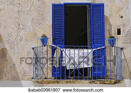 Stock Photo - "Laundry drying on a balcony, Otranto, Province of Lecce, Apulia, Italy, Europe". Fotosearch