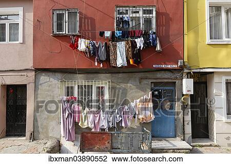 "Laundry hanging on washing lines on a facade, Fener quarter, Fatih district, Istanbul, European Side, Turkey, Asia" View Large Photo Image Stock Image - "Laundry hanging on washing lines on a facade, Fener quarter, Fatih district, Istanbul, European Side, Turkey, Asia". Fotosearch