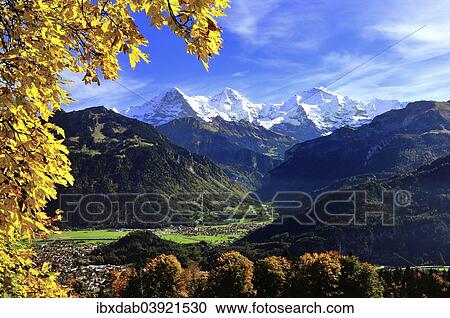 Stock Image - "Lauterbrunnen valley with Eiger, Monch, Jungfrau, in front Interlaken and Wilderswil, Canton of Bern, Switzerland, Europe". Fotosearch