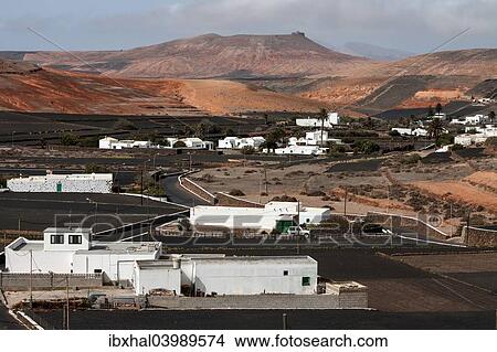 Picture - "Lava fields, white buildings, Los Valles, Lanzarote, Canary Islands, Spain, Europe". Fotosearch