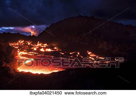 Stock Image - "Lava flow at night, Tolbachik volcano, Kamchatka, Russia, Europe". Fotosearch