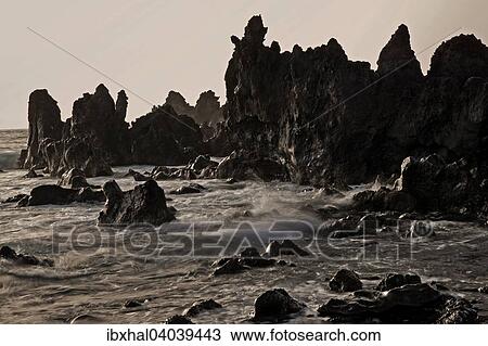 "Lava rock in the sea, surf, evening light, near Los Hervideros, Lanzarote, Canary Islands, Spain, Europe" View Large Photo Image Stock Image - "Lava rock in the sea, surf, evening light, near Los Hervideros, Lanzarote, Canary Islands, Spain, Europe". Fotosearch