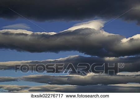 "Layers of clouds, morning mood, Germany, Europe" View Large Photo Image Stock Photo - "Layers of clouds, morning mood, Germany, Europe". Fotosearch