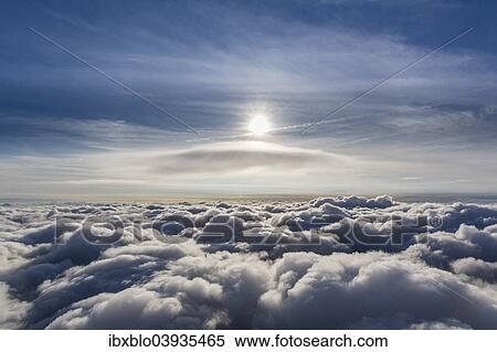 "Lenticular cloud, Cumulus lenticularis, above the top layer of clouds, North Rhine-Westphalia, Germany, Europe" View Large Photo Image Stock Photography - "Lenticular cloud, Cumulus lenticularis, above the top layer of clouds, North Rhine-Westphalia, Germany, Europe". Fotosearch