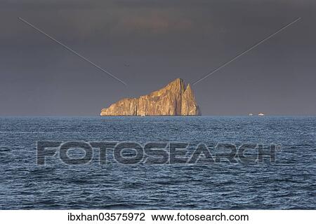 "Leon Dormido or Kicker Rock in the evening light, Galapagos Islands, Ecuador, South America" View Large Photo Image Stock Image - "Leon Dormido or Kicker Rock in the evening light, Galapagos Islands, Ecuador, South America". Fotosearch