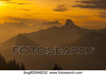 "Leonhardstein, Rossstein and Buchstein, in the back the Wetterstein or Werdenfelser Alps with the Zugspitze at sunset, from Mt. Wallenberg, Upper Bavaria, Bavaria, Germany, Europe" View Large Photo Image Stock Image - "Leonhardstein, Rossstein and Buchstein, in the back the Wetterstein or Werdenfelser Alps with the Zugspitze at sunset, from Mt. Wallenberg, Upper Bavaria, Bavaria, Germany, Europe". Fotosearch