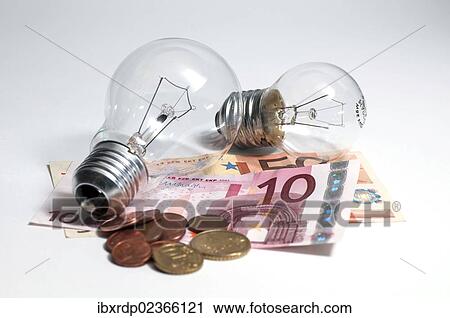 Stock Image - "Light bulbs with euro banknotes and small change, symbolic image rising electricity costs". Fotosearch