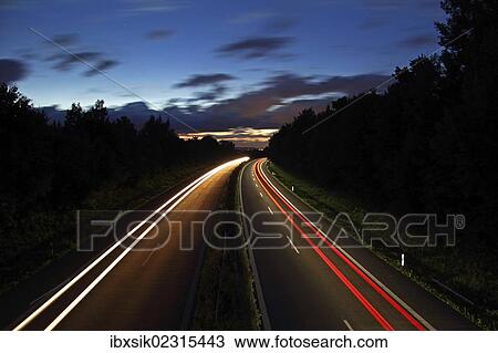 "Light trails, dusk, highway, federal road B30, near Biberach, Upper Swabia, Baden-Wuerttemberg, Germany, Europe" View Large Photo Image Stock Image - "Light trails, dusk, highway, federal road B30, near Biberach, Upper Swabia, Baden-Wuerttemberg, Germany, Europe". Fotosearch