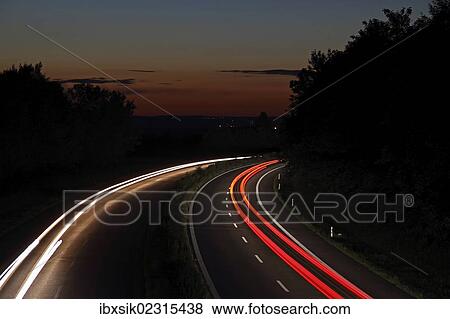"Light trails, dusk, highway, federal road B30, near Biberach, Upper Swabia, Baden-Wuerttemberg, Germany, Europe" View Large Photo Image Stock Photo - "Light trails, dusk, highway, federal road B30, near Biberach, Upper Swabia, Baden-Wuerttemberg, Germany, Europe". Fotosearch