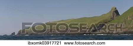 "Lighthouse and so-called Atlantic Bridge between Mykinesholmur or Mykinesholm and Mykines, Utoyggjar, Faroe Islands, Denmark, Europe" View Large Photo Image Stock Image - "Lighthouse and so-called Atlantic Bridge between Mykinesholmur or Mykinesholm and Mykines, Utoyggjar, Faroe Islands, Denmark, Europe". Fotosearch