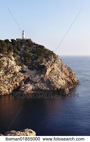 "Lighthouse at Cabo de Capdepera near Cala Ratjada, Majorca, Balearic Islands, Spain, Europe" View Large Photo Image Stock Image - "Lighthouse at Cabo de Capdepera near Cala Ratjada, Majorca, Balearic Islands, Spain, Europe". Fotosearch