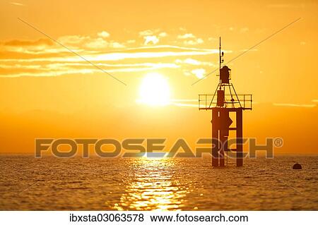 "Lighthouse at sunrise, at Hoernle, Lake Constance, Konstanz, Baden-Wurttemberg, Germany, Europe" View Large Photo Image Stock Photo - "Lighthouse at sunrise, at Hoernle, Lake Constance, Konstanz, Baden-Wurttemberg, Germany, Europe". Fotosearch