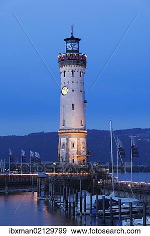 "Lighthouse at the harbour at dusk, Lindau on Lake Constance, Swabia, Bavaria, Germany, Europe, PublicGround, Europe" View Large Photo Image Stock Photo - "Lighthouse at the harbour at dusk, Lindau on Lake Constance, Swabia, Bavaria, Germany, Europe, PublicGround, Europe". Fotosearch