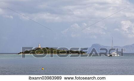 "Lighthouse on the island Alcanada, off Alcudia, Majorca, Balearic Islands, Spain, Europe" View Large Photo Image Stock Photo - "Lighthouse on the island Alcanada, off Alcudia, Majorca, Balearic Islands, Spain, Europe". Fotosearch