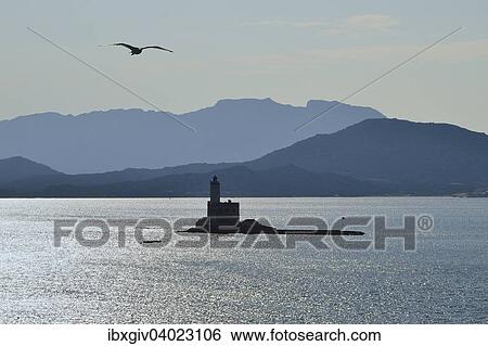 Stock Photograph - "Lighthouse on the Isola della Bocca, Olbia, Province of Olbia-Tempio, Sardinia, Italy, Europe". Fotosearch