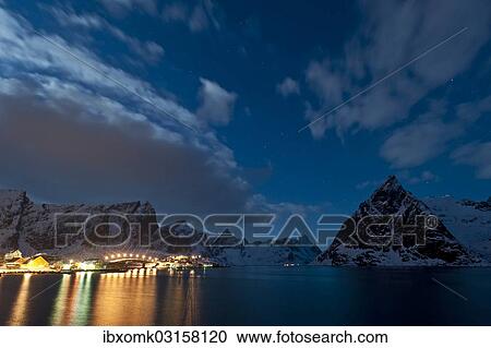 "Lights reflecting in the water, rugged mountains, moonlight, clouds, Reine, Moskenesoy, Lofoten, Nordland, Norway, Europe" View Large Photo Image Stock Image - "Lights reflecting in the water, rugged mountains, moonlight, clouds, Reine, Moskenesoy, Lofoten, Nordland, Norway, Europe". Fotosearch