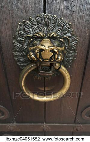 "Lion head as a door knocker on the Romanesque entrance portal of the Scots monastery of St. Jacob, Regensburg, Upper Palatinate, Bavaria, Germany, Europe" View Large Photo Image Stock Image - "Lion head as a door knocker on the Romanesque entrance portal of the Scots monastery of St. Jacob, Regensburg, Upper Palatinate, Bavaria, Germany, Europe". Fotosearch
