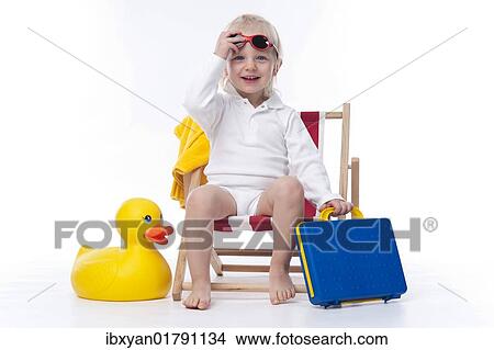 Little girl with sunshades in beach chair View Large Photo Image Picture - Little girl with sunshades in beach chair. Fotosearch