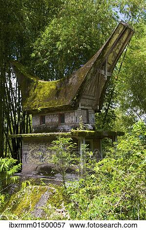 Stock Photo - "Lo'ko'mata burial site in the shape of a traditional Toraja house, near Ratepao, Sulawesi, Indonesia, Southeast Asia, Asia". Fotosearch