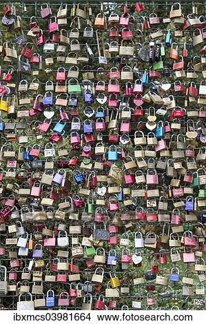 "Love locks on a wire fence, Kassel, Hesse, Germany, Europe" View Large Photo Image Picture - "Love locks on a wire fence, Kassel, Hesse, Germany, Europe". Fotosearch
