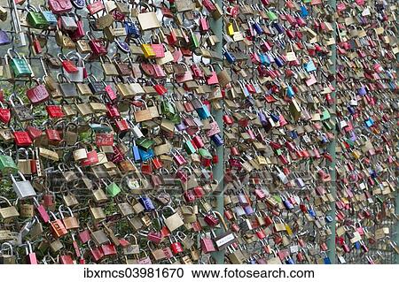 "Love locks on a wire fence, Kassel, Hesse, Germany, Europe" View Large Photo Image Stock Image - "Love locks on a wire fence, Kassel, Hesse, Germany, Europe". Fotosearch