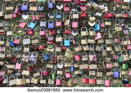 "Love locks on a wire fence, Kassel, Hesse, Germany, Europe" View Large Photo Image Stock Photography - "Love locks on a wire fence, Kassel, Hesse, Germany, Europe". Fotosearch