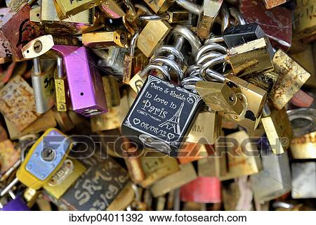 "Love padlocks attached to the railing of the Pont de l'Archeveche bridge, Paris, France, Europe" View Large Photo Image Stock Image - "Love padlocks attached to the railing of the Pont de l'Archeveche bridge, Paris, France, Europe". Fotosearch