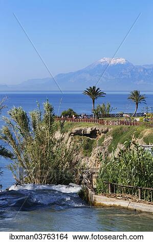 Picture - "Lower Dueden Waterfall, in front of Tahtali Dagi Mountain, Lara, Antalya, Antalya Province, Turkey, Asia". Fotosearch