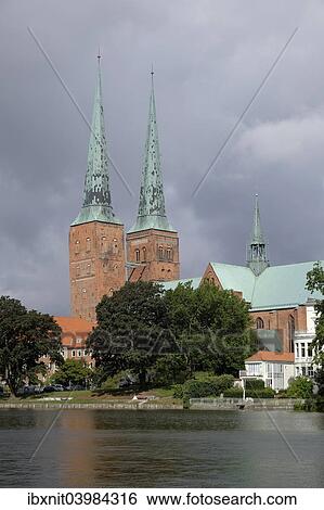 "Lubeck Cathedral on Muhlenteich pond, Lubeck, Schleswig-Holstein, Germany, Europe" View Large Photo Image Stock Photograph - "Lubeck Cathedral on Muhlenteich pond, Lubeck, Schleswig-Holstein, Germany, Europe". Fotosearch